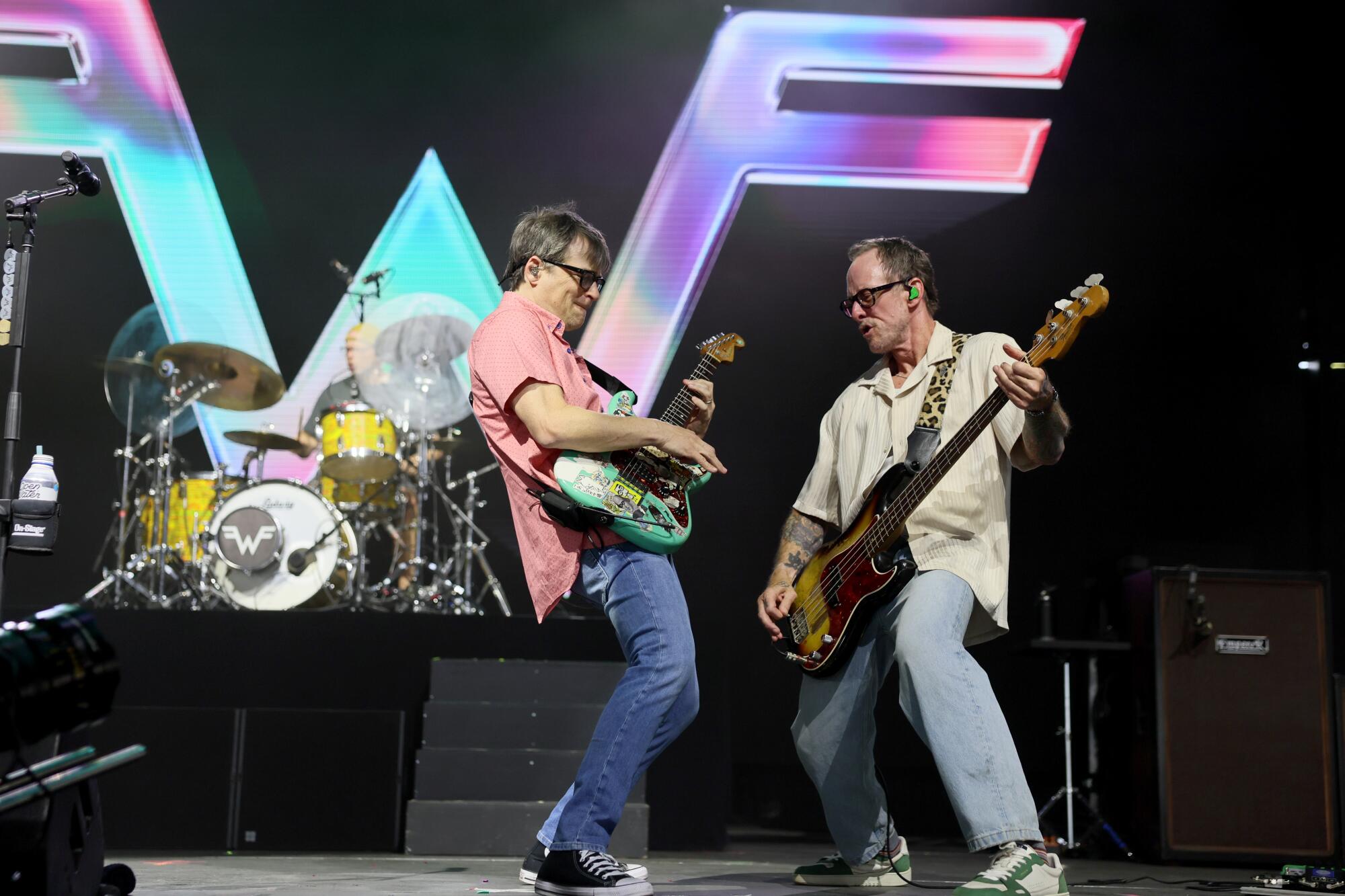 Rivers Cuomo and Scott Shriner of Weezer perform on the Mojave stage at the 2025 Coachella Valley Music and Arts Festival.