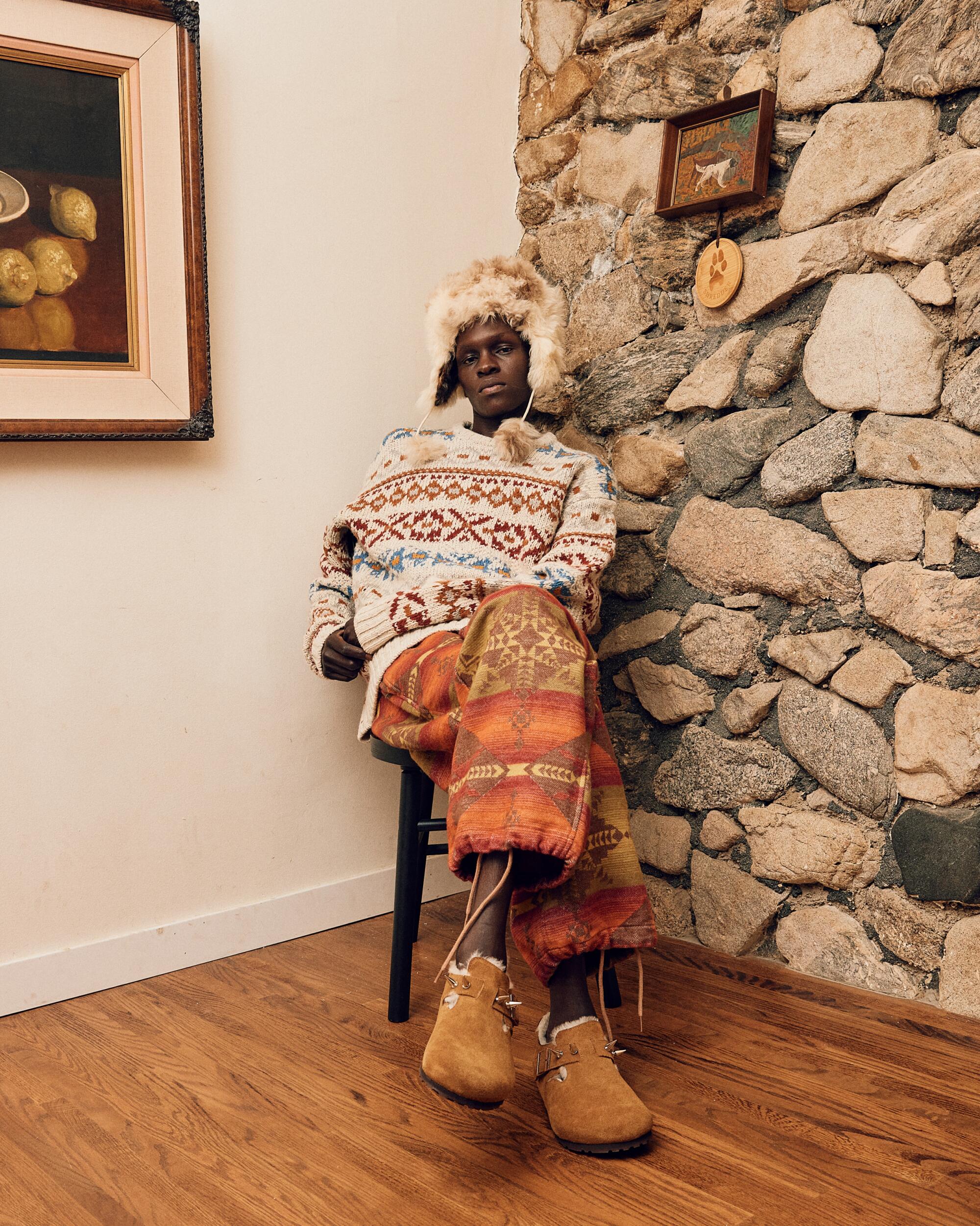 Marwang wears all BEAMS and Alpaca fur hat from Peru.