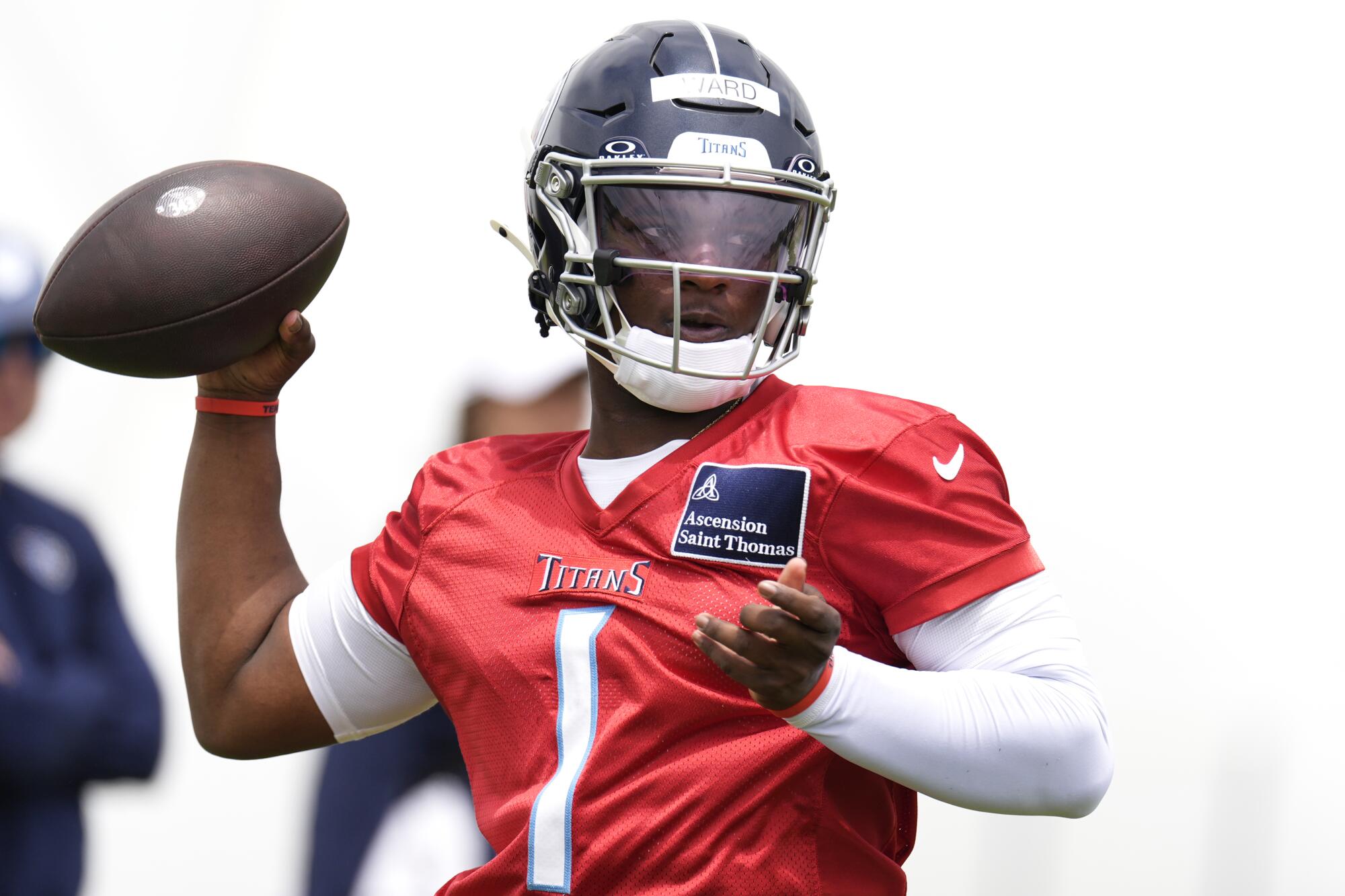 Tennessee Titans quarterback Cam Ward passes during rookie minicamp on May 10.