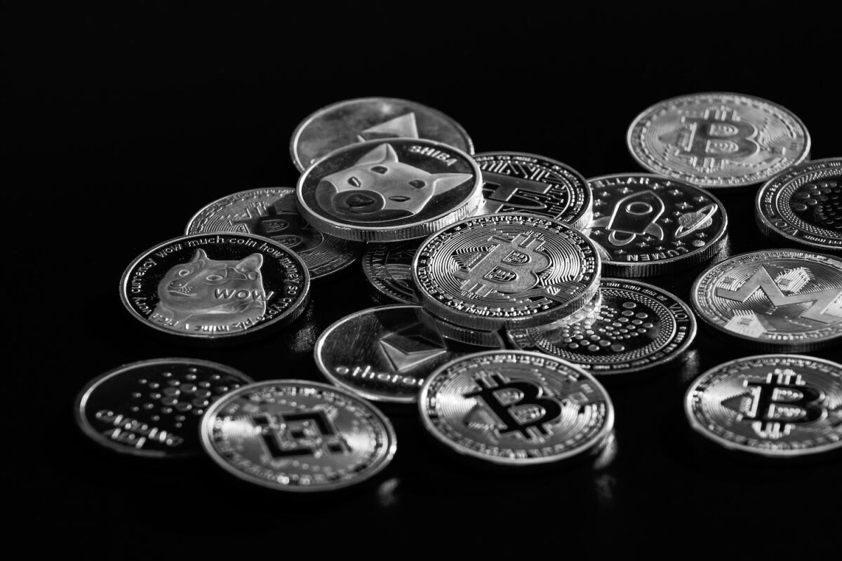 Pile of cryptocurrencies over dark background