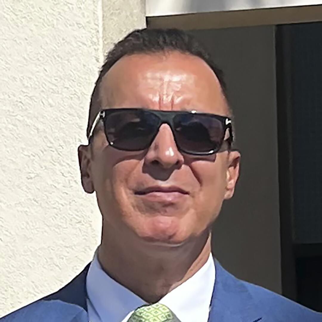 A portrait of Sirous Razipour