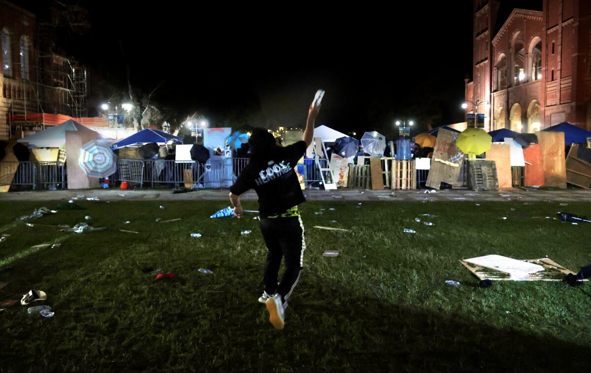 Tents and barricades erected at a UCLA encampment.