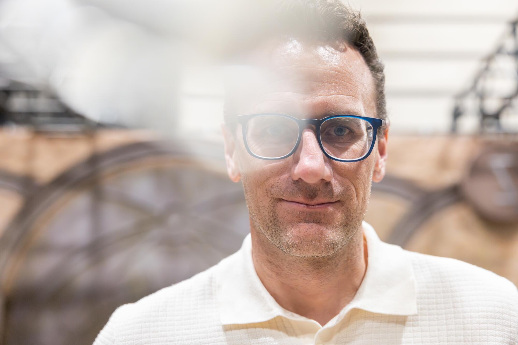 A man in glasses.