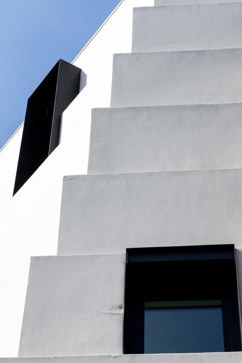Stacked stucco forms of a building