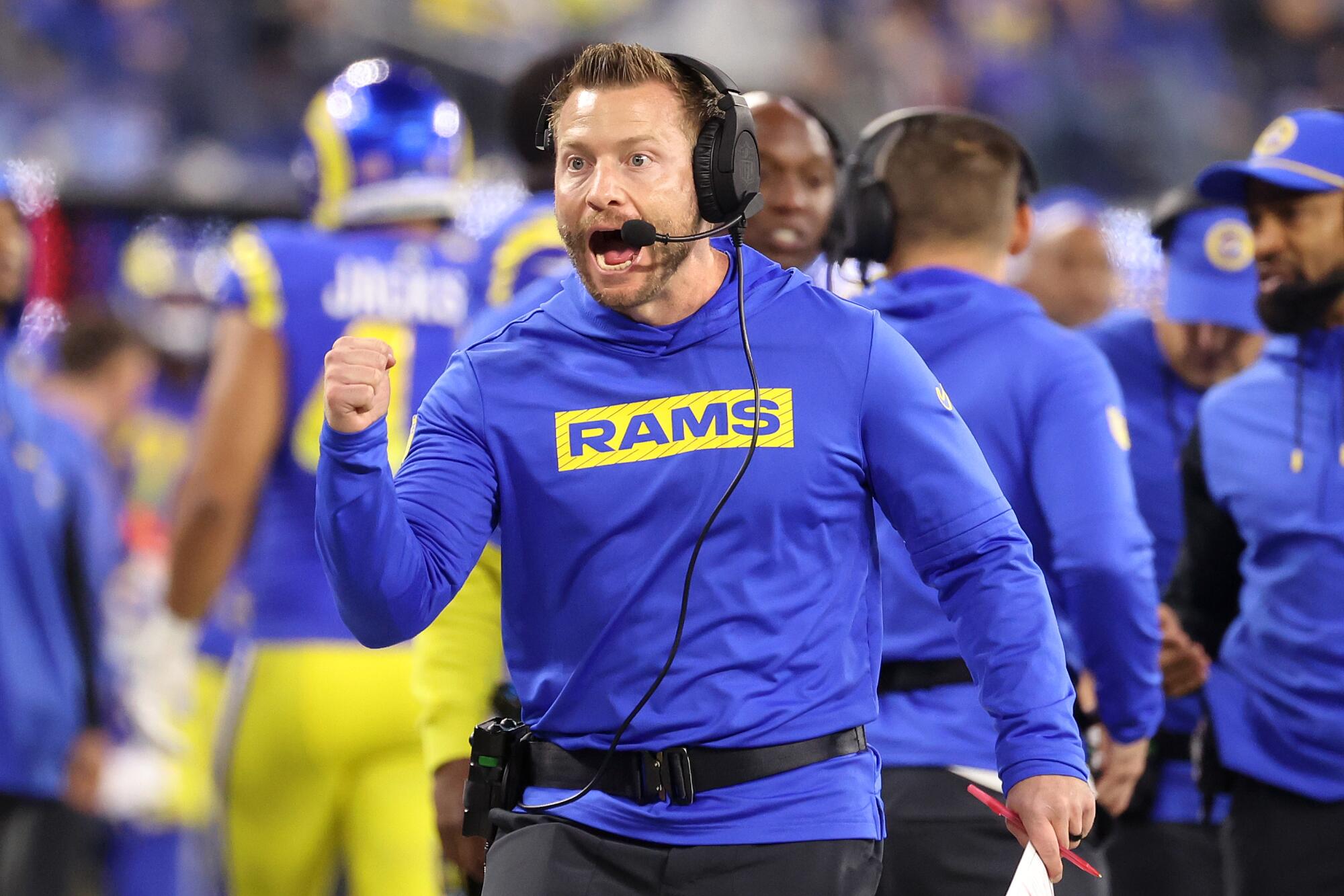 Rams coach Sean McVay celebrates a play against the Cardinals with a fist pump.