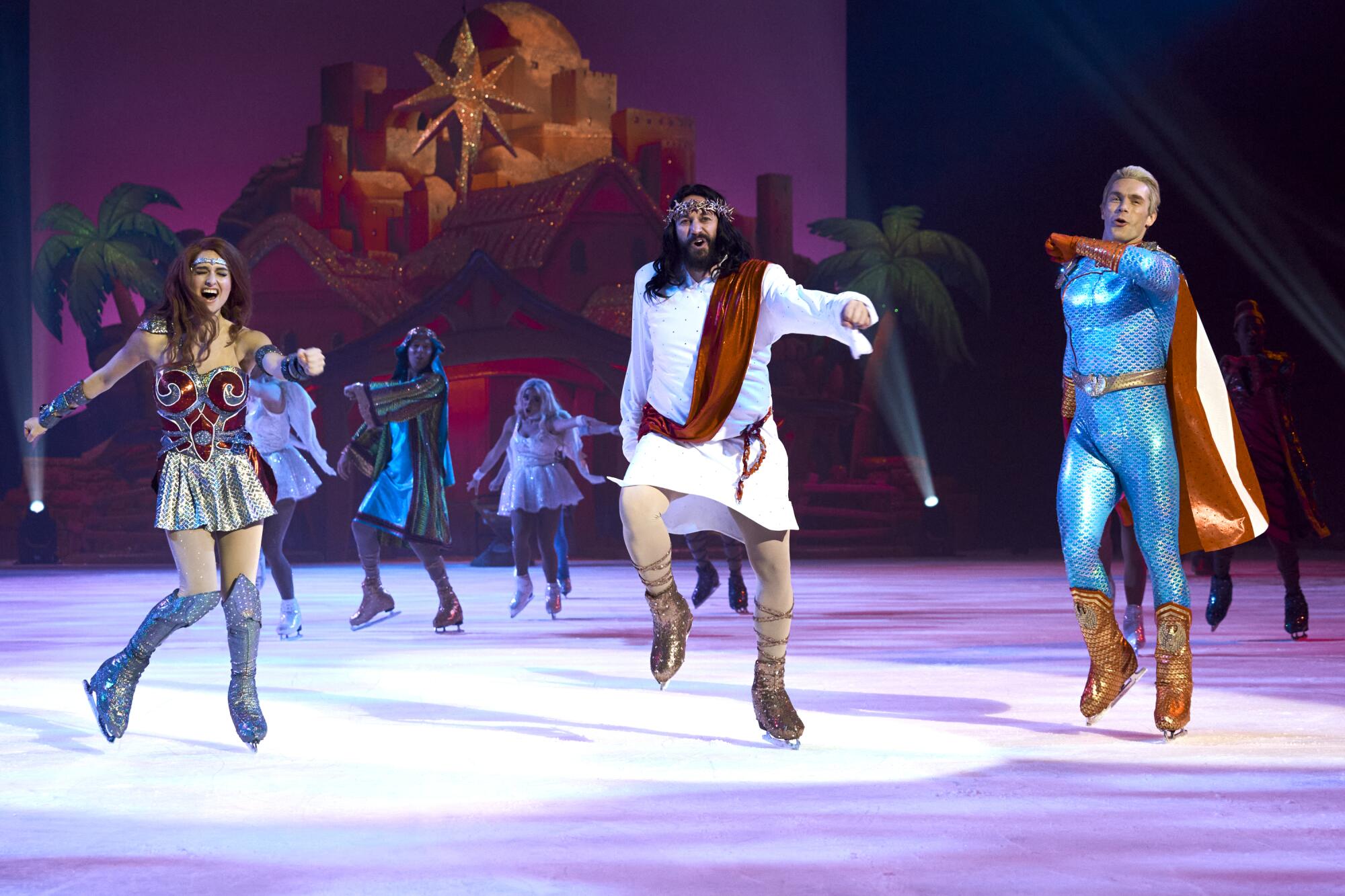 People in superhero costumes ice skating